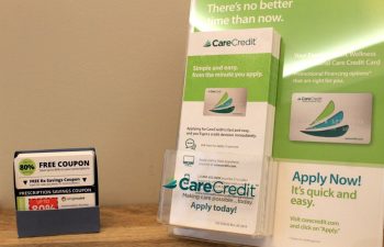prescription saving coupons and CareCredit leaflets