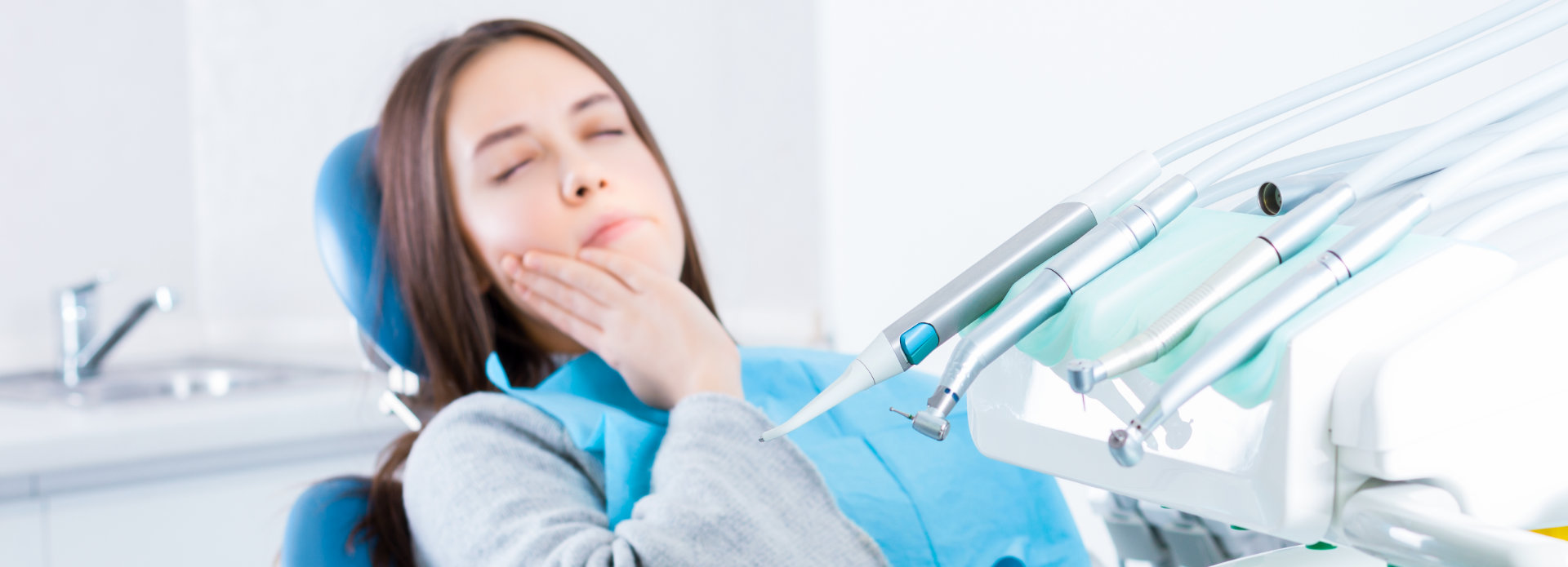 Woman with dental pain during the same day dental appointment in Acworth, GA