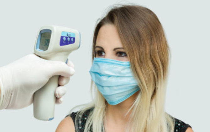 temperature check before dental appointment at Dental Care Acworth