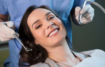 A relaxed woman during a dental appointment.