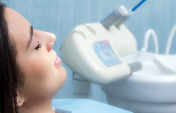 A relaxed woman under dental sedation.