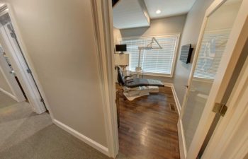 A hallway leading to a treatment room at Dental Care Acworth