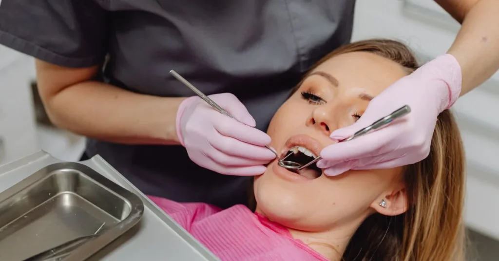 Dentist performing root canal treatment in Acworth on relaxed patient