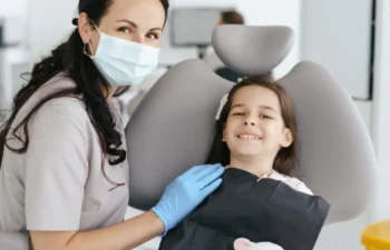 Pediatric Dentist in Acworth caring for smiling young patient